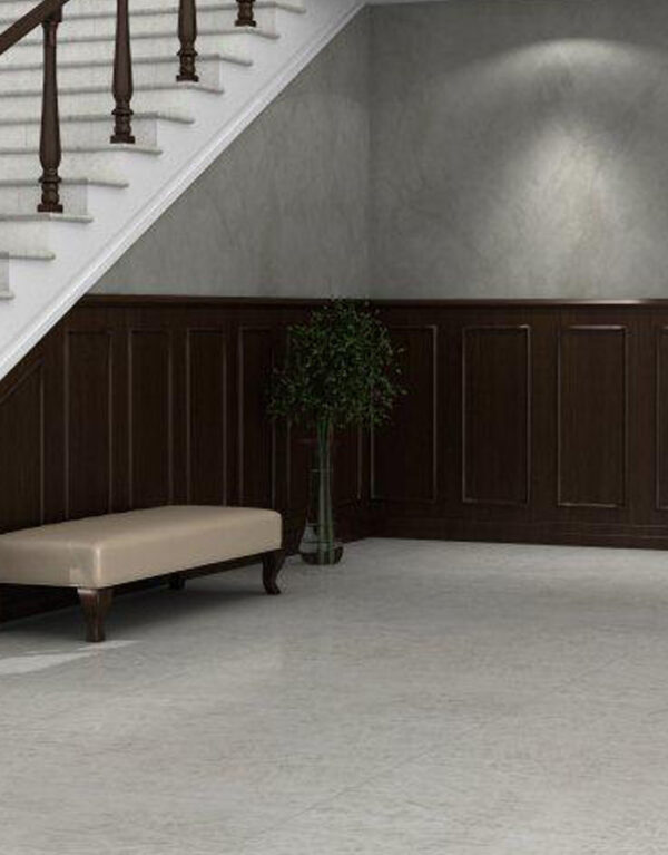 Carrelage Zuccherino 60x120 lappato blanc avec points colorés rappelant l’arc-en-ciel.
